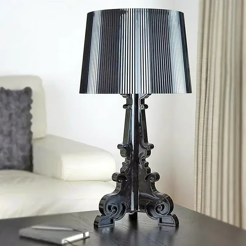 Baroque-style table lamp with ribbed shade and ornate decorative base