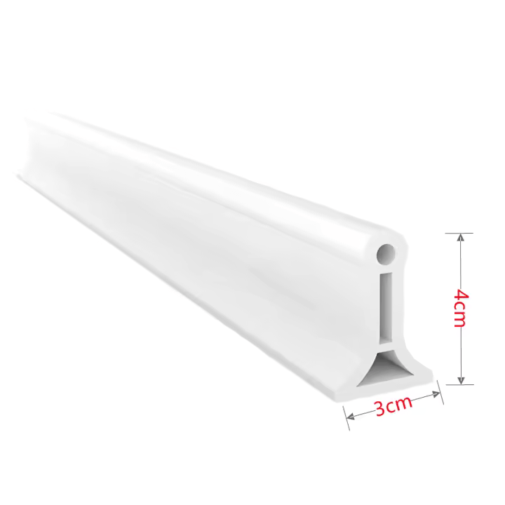 Shaped shower seal strip for bathroom leak prevention