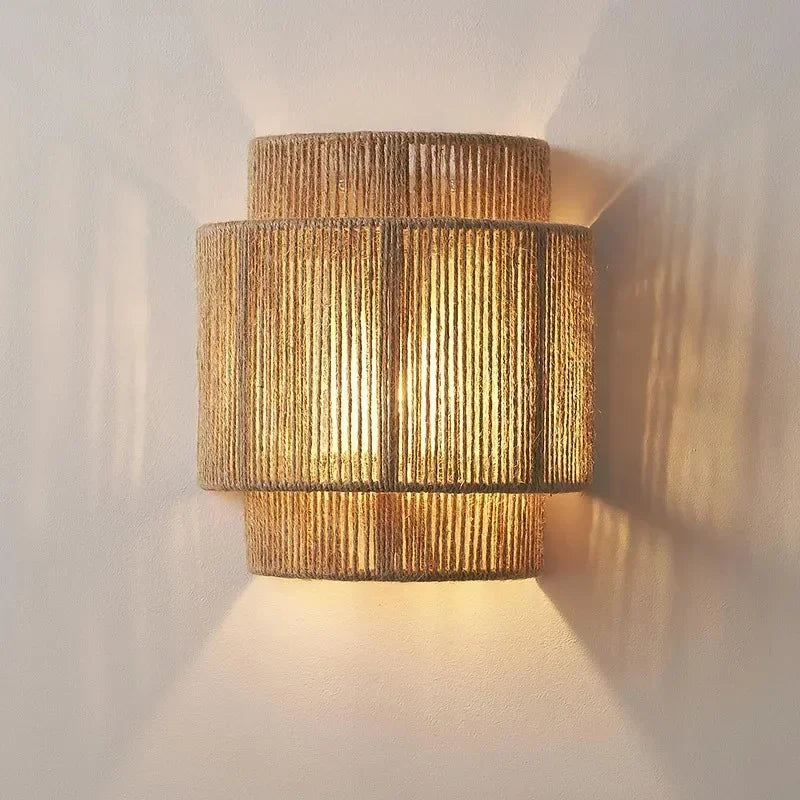 Brown woven rattan wall lamp with layered cylindrical shade