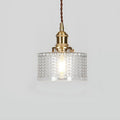 Round patterned glass pendant light with brass fitting and twisted cord