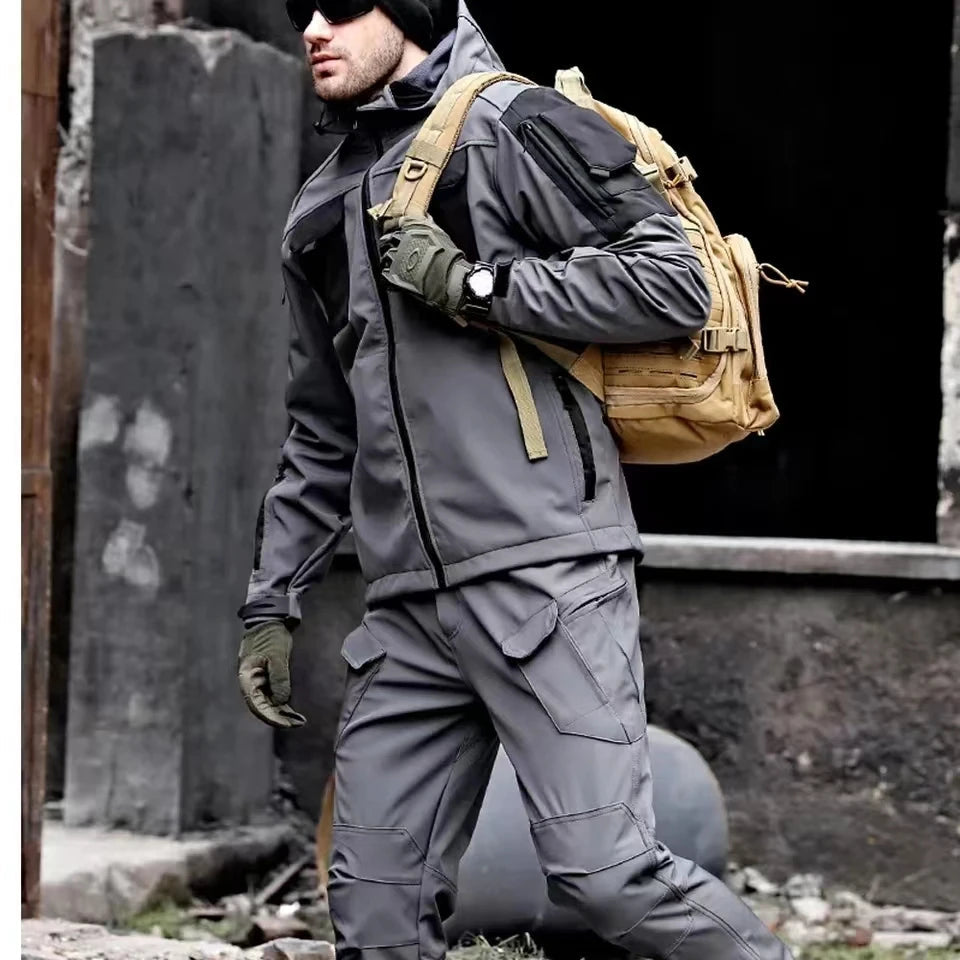 Outdoor cargo jacket and trousers set with hood and multiple utility pockets