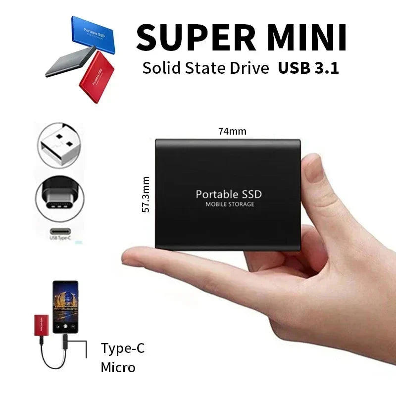 Portable SSD external drive with USB cable beside a laptop