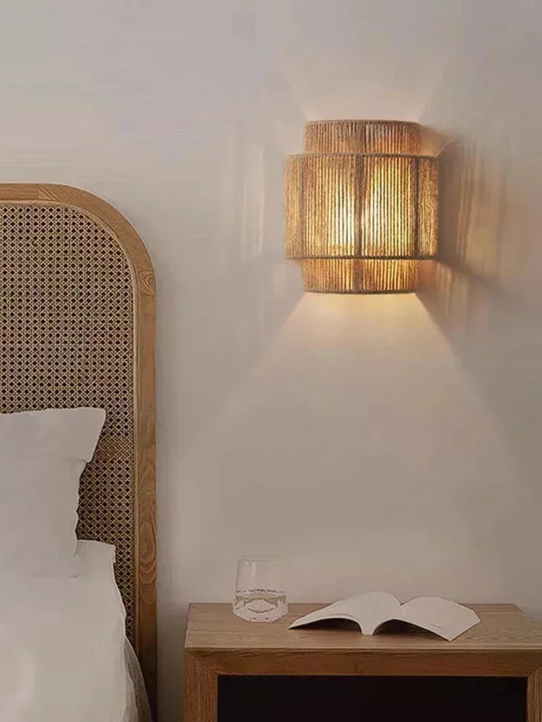 Brown woven rattan wall lamp with layered cylindrical shade