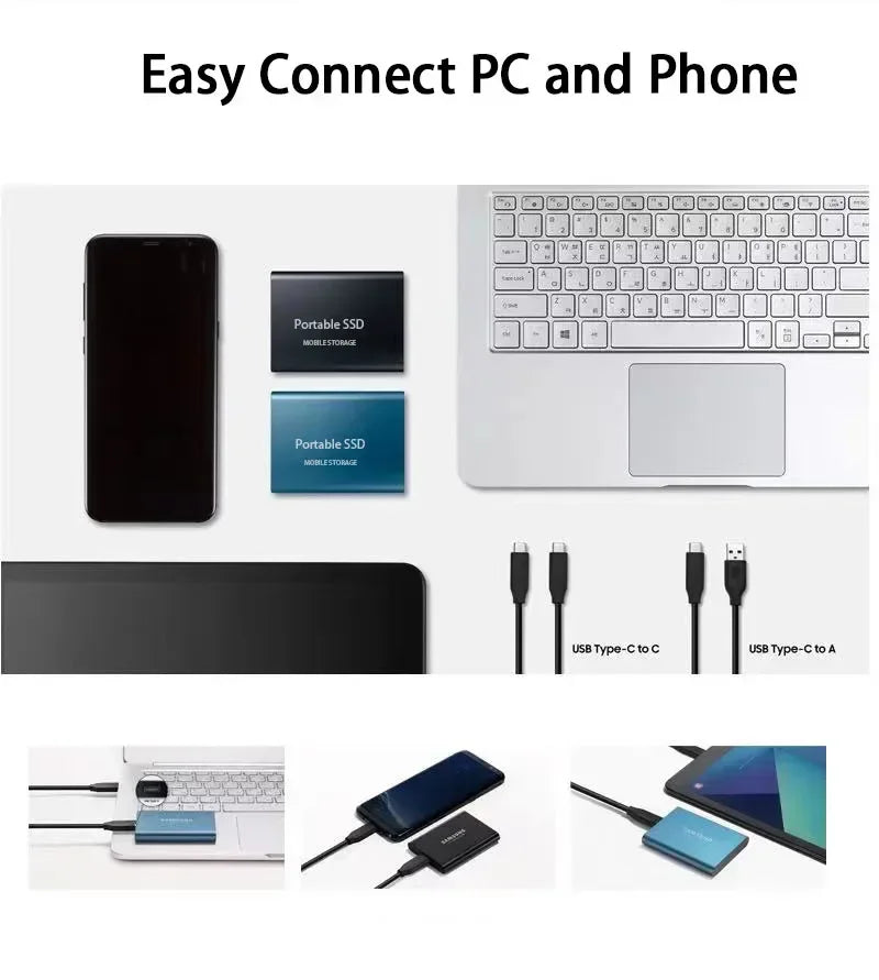 Portable SSD external drive with USB cable beside a laptop