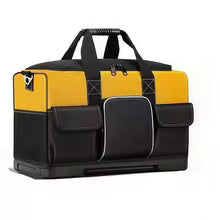 Yellow and black wide-mouth tool bag with molded base and shoulder strap
