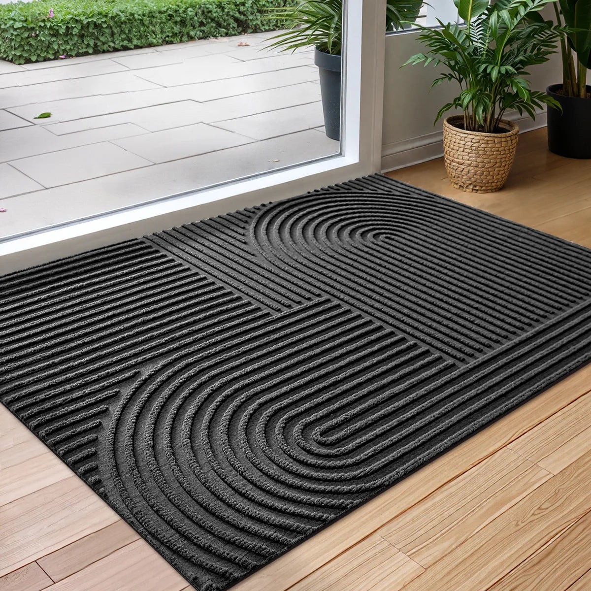 Rectangular textured geometric door mat at an entrance