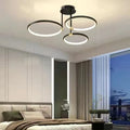 Modern LED ceiling light with four circular geometric rings