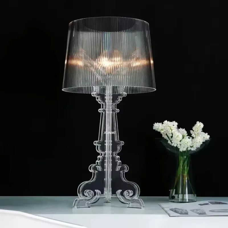 Baroque-style table lamp with ribbed shade and ornate decorative base