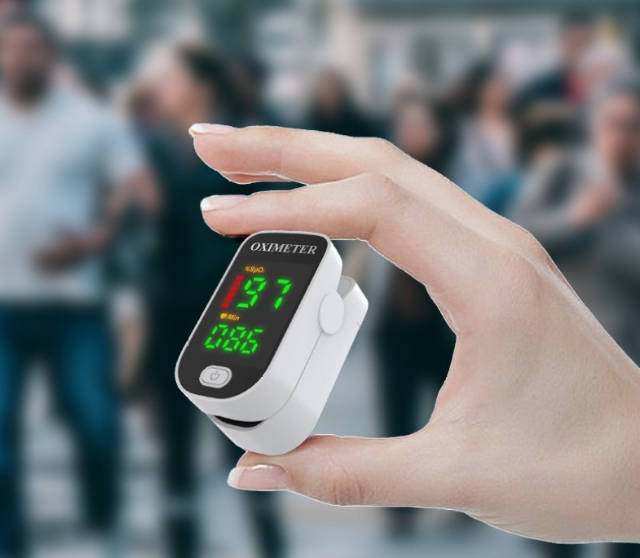 Fingertip pulse oximeter with digital blood oxygen and heart rate display
