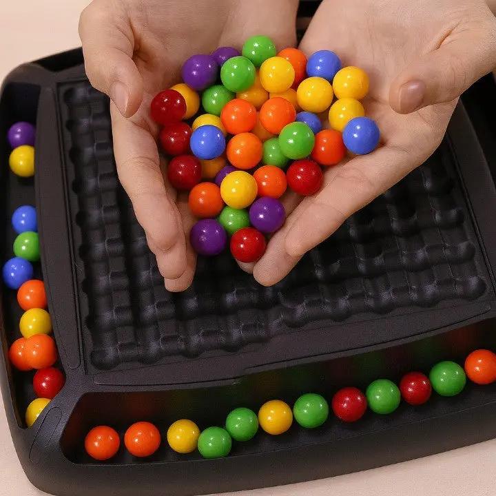 Black strategy board game tray with colourful balls