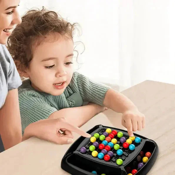 Black strategy board game tray with colourful balls