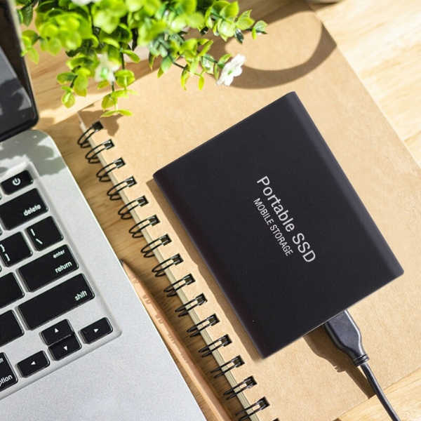 Portable SSD external storage drive with USB cable