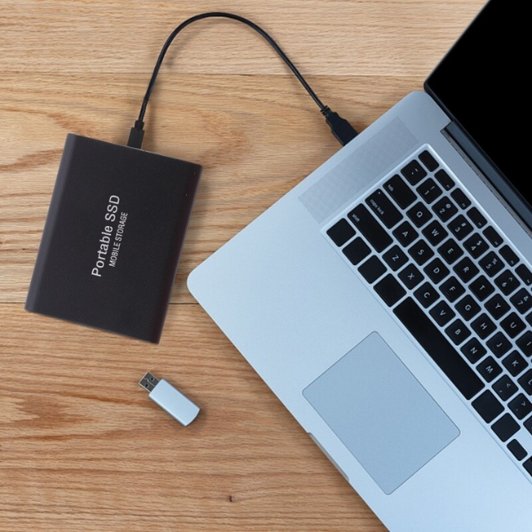 Portable SSD external storage drive with USB cable