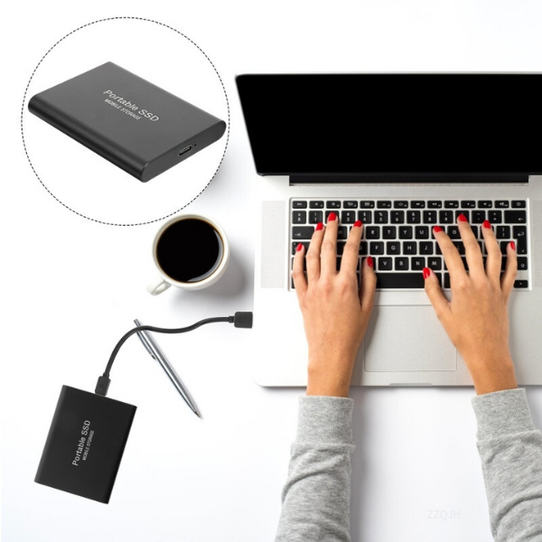 Portable SSD external storage drive with USB cable