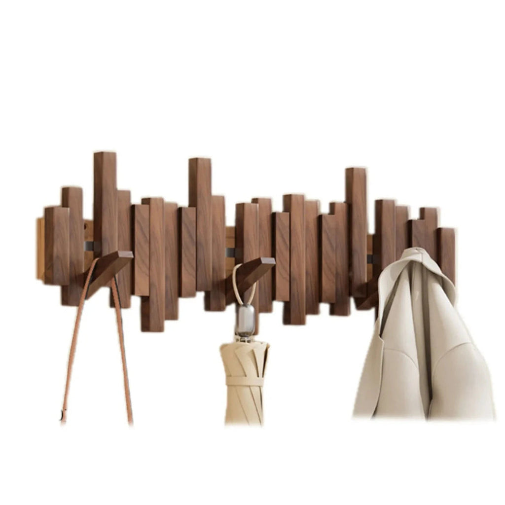 Wall-mounted ribbed coat rack with folding hooks