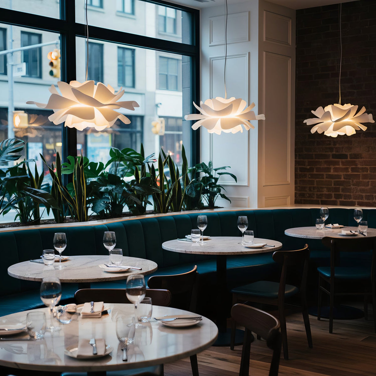White floral pendant light with layered petal shade and hanging cord