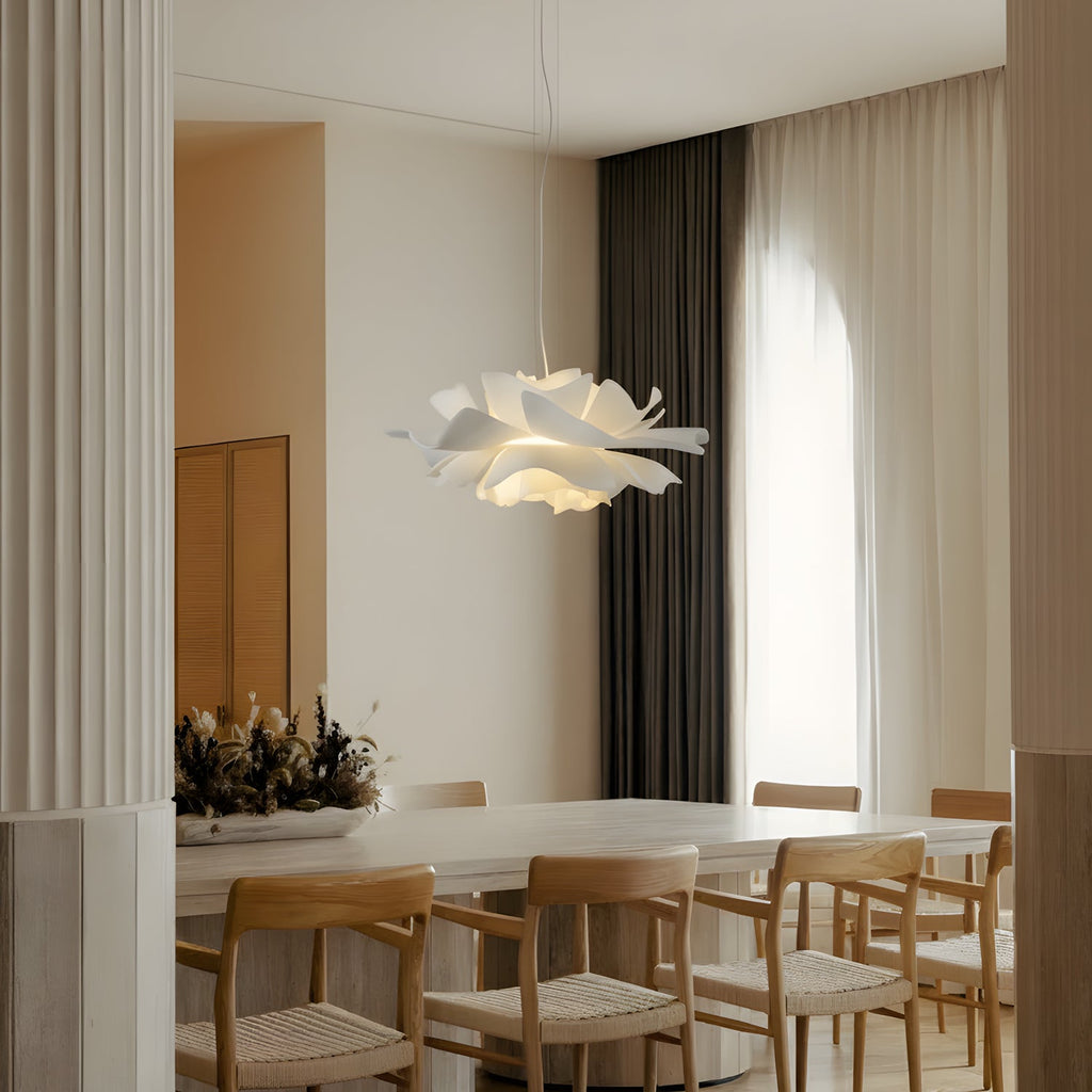 White floral pendant light with layered petal shade and hanging cord