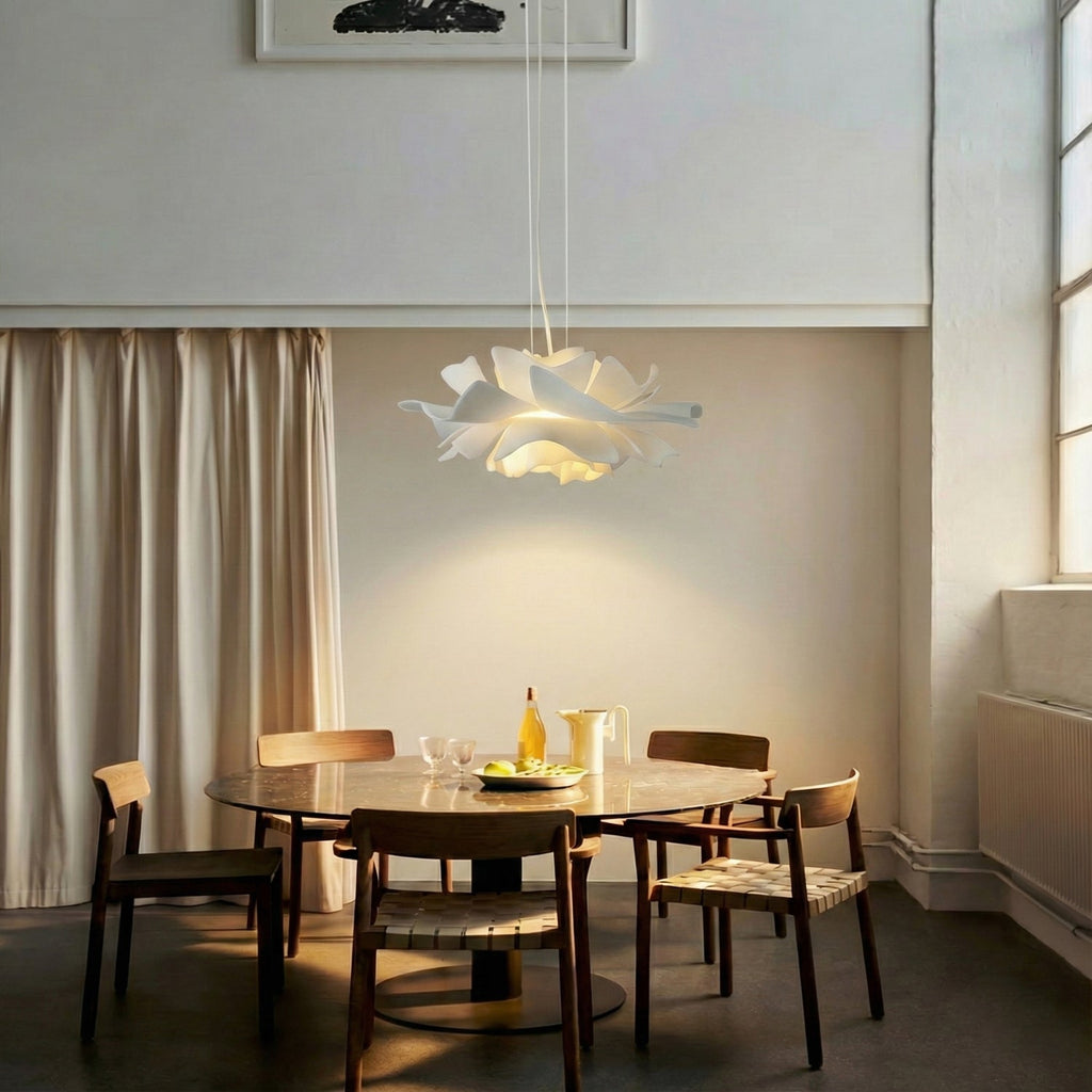 White floral pendant light with layered petal shade and hanging cord