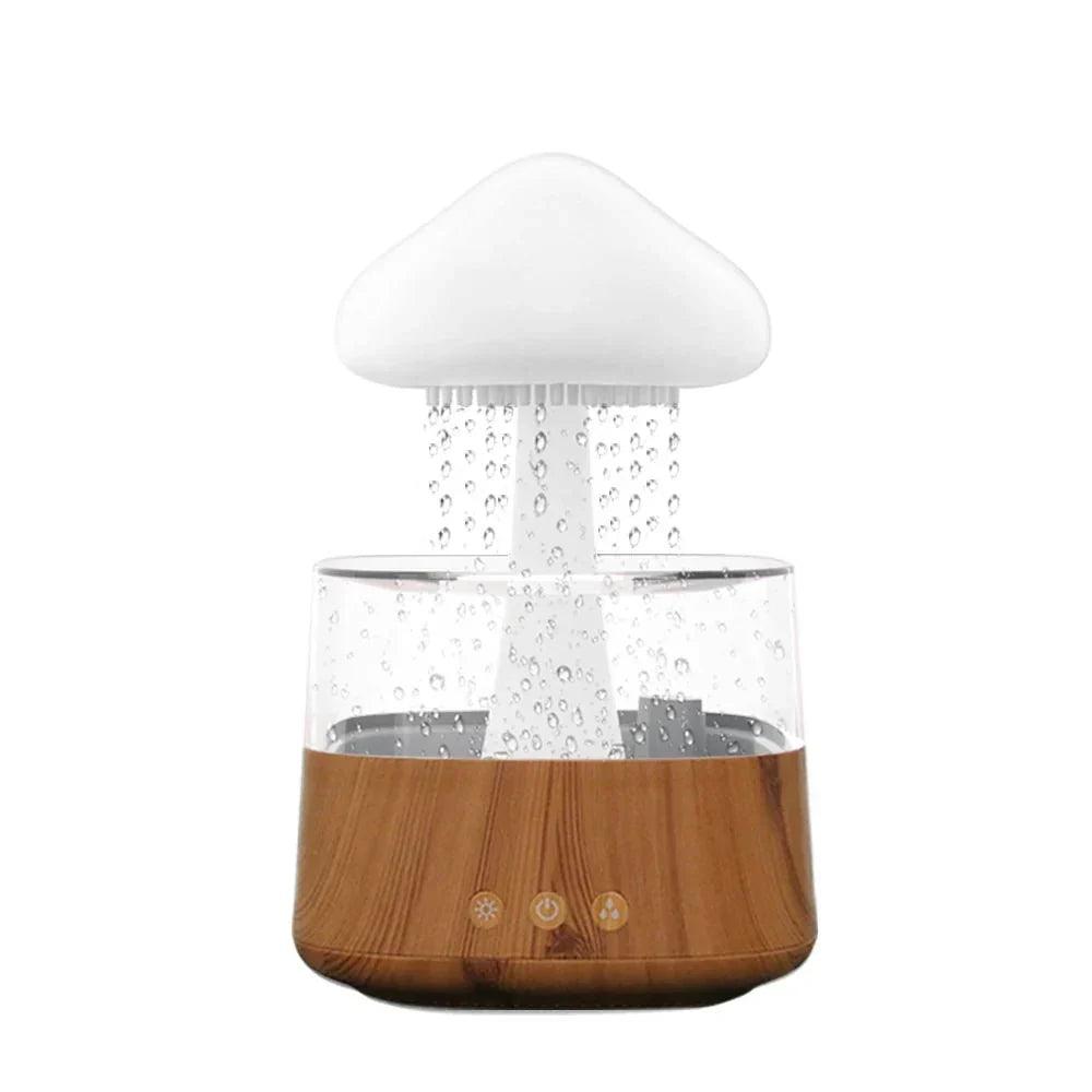 Cloud-shaped humidifier with transparent reservoir and decorative water feature