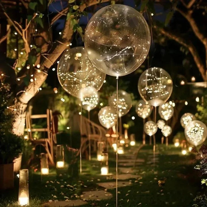 Clear balloon-style party lights with warm white light points