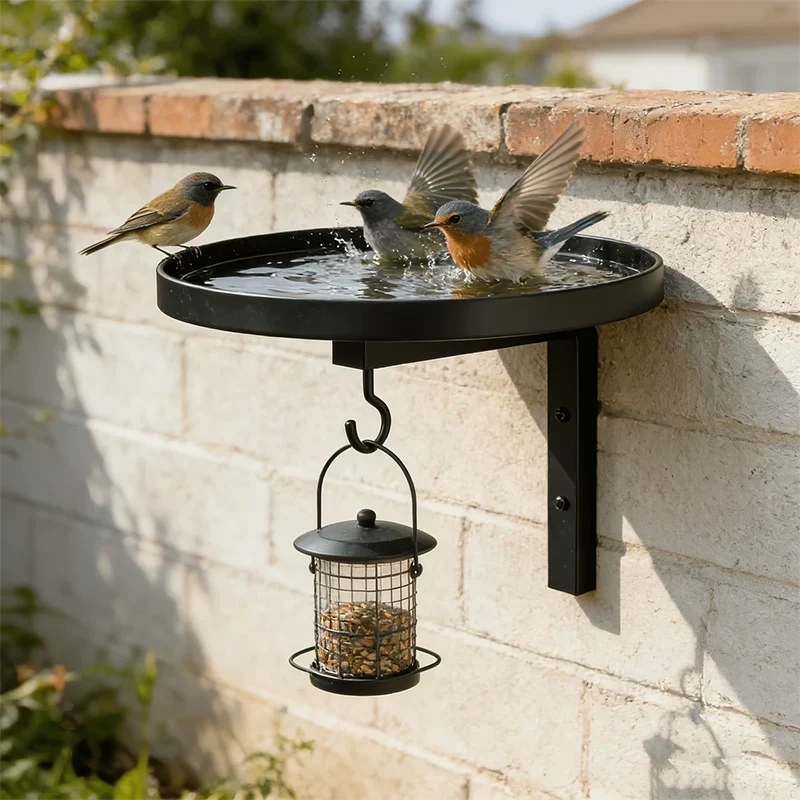 Black wall-mounted bird feeding station with water trays and hanging seed feeder