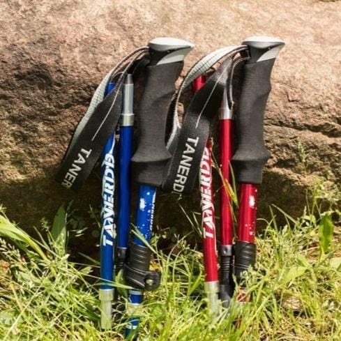 Foldable adjustable trekking poles with ergonomic handles and wrist straps