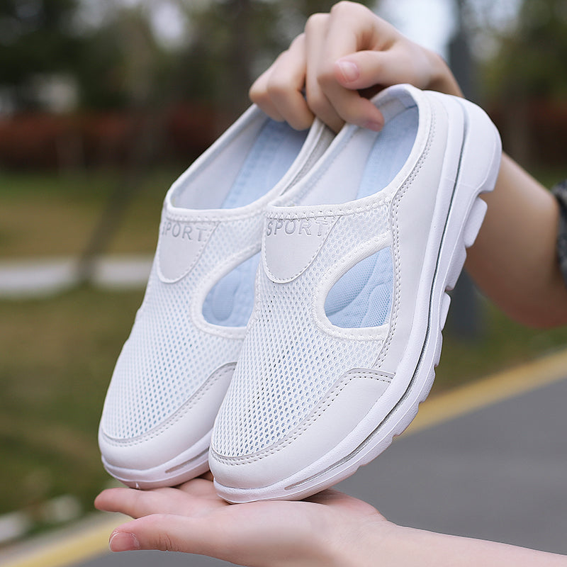 Backless slip-on flats with mesh-textured upper, side cutouts and thick textured sole