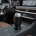 Portable beverage warmer and cooler positioned in a car cup holder