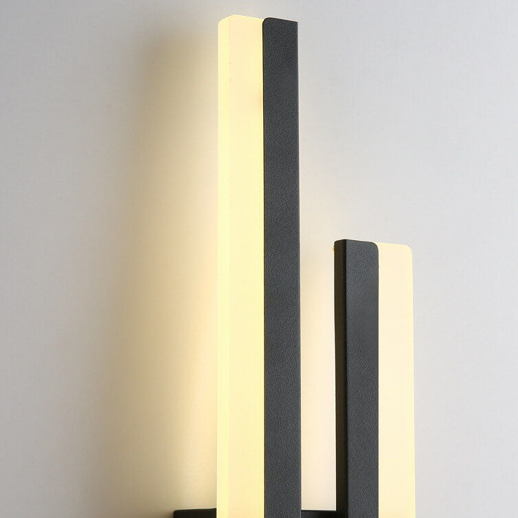 Modern linear two-light LED wall sconce with vertical illuminated bars