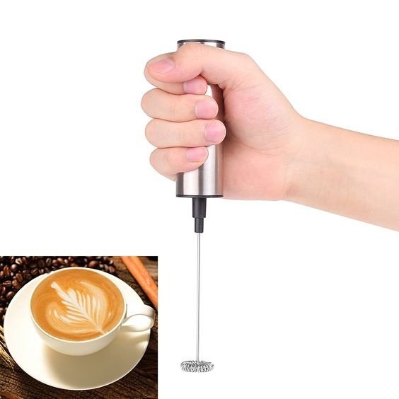 Silver cordless handheld milk frother with whisk head and storage sleeve