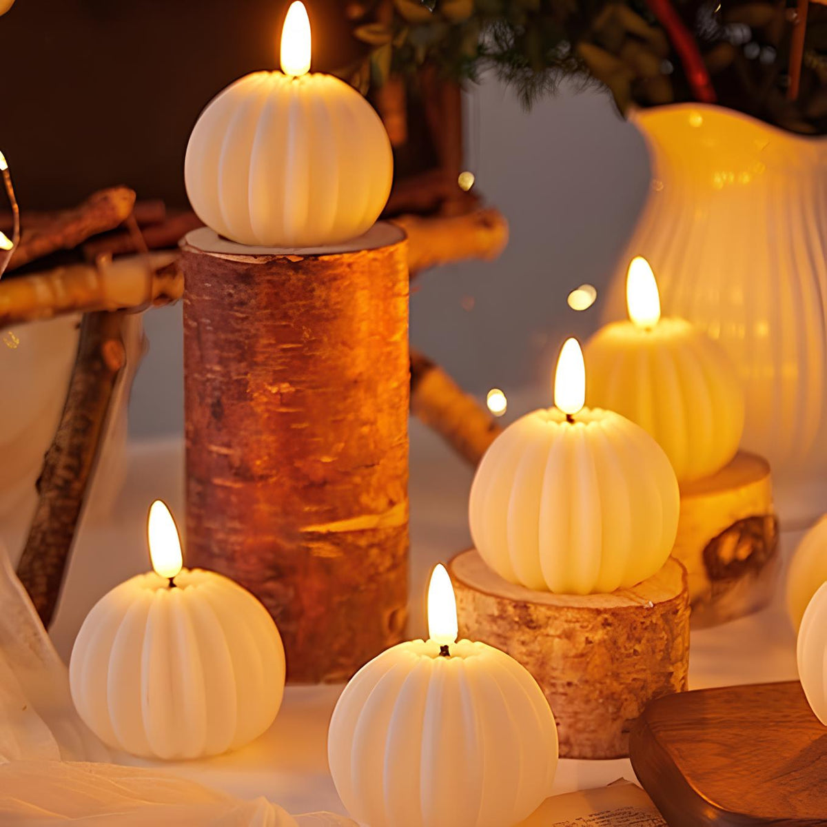 White flameless LED candle with a warm flickering flame-style light