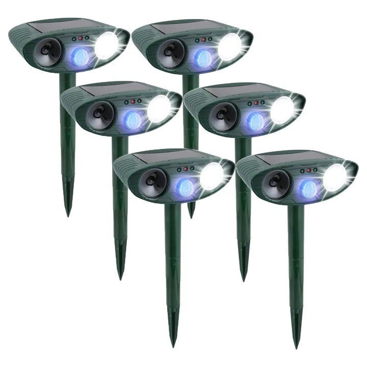 Green solar ultrasonic garden animal repeller with pointed stake and front lights