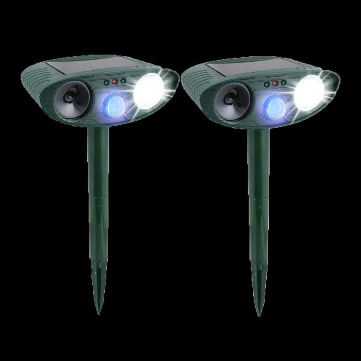 Green solar ultrasonic garden animal repeller with pointed stake and front lights