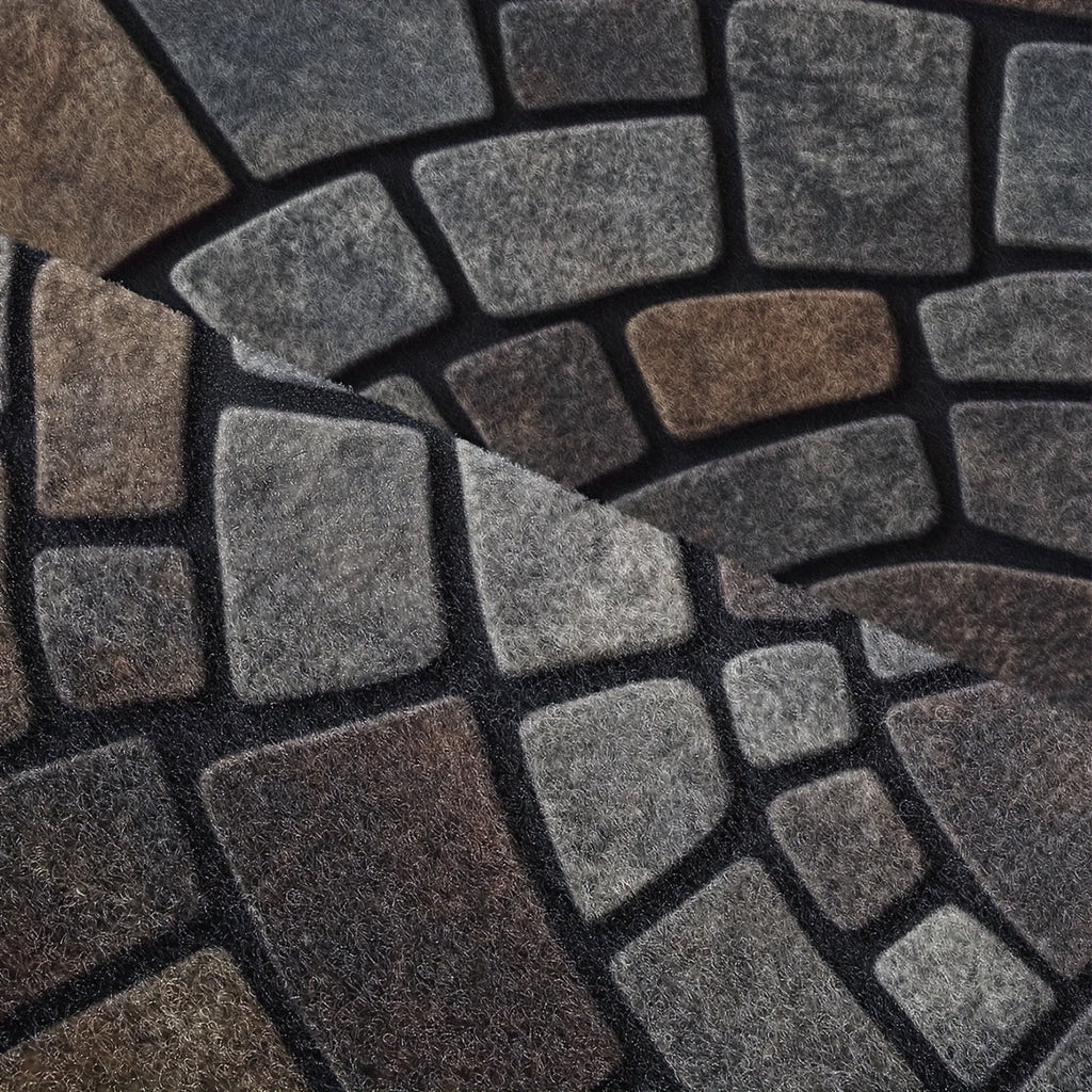 Half-circle gray geometric mosaic door mat at an entryway
