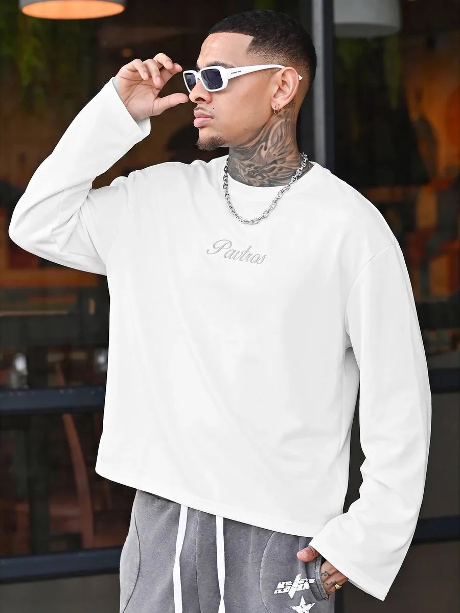 Oversized long sleeve shirt with graphic slogan design