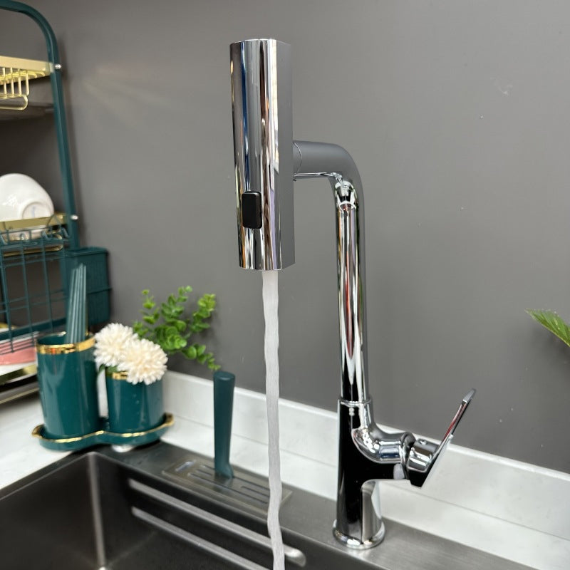 Chrome kitchen faucet attachment with flexible spray head over a sink
