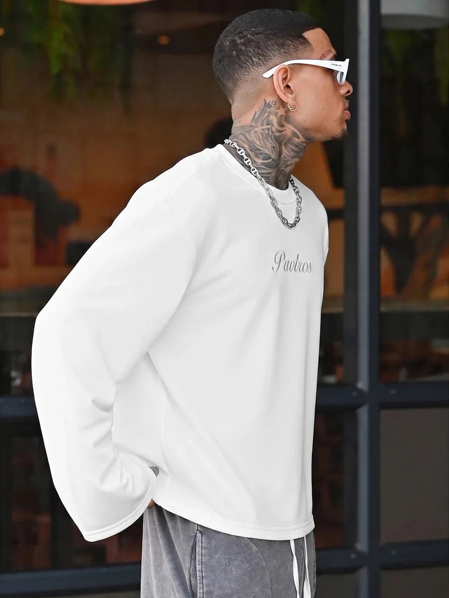Oversized long sleeve shirt with graphic slogan design