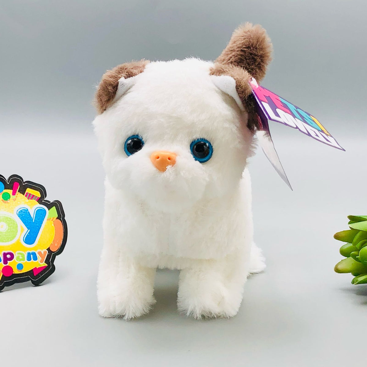 Walking plush cat toy with sound in white and orange striped designs