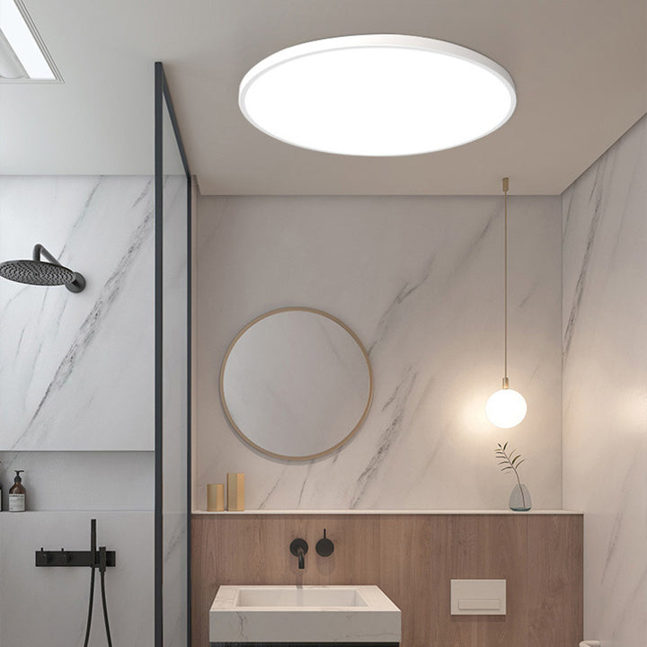 Round flush-mount LED ceiling light with a smooth circular diffuser