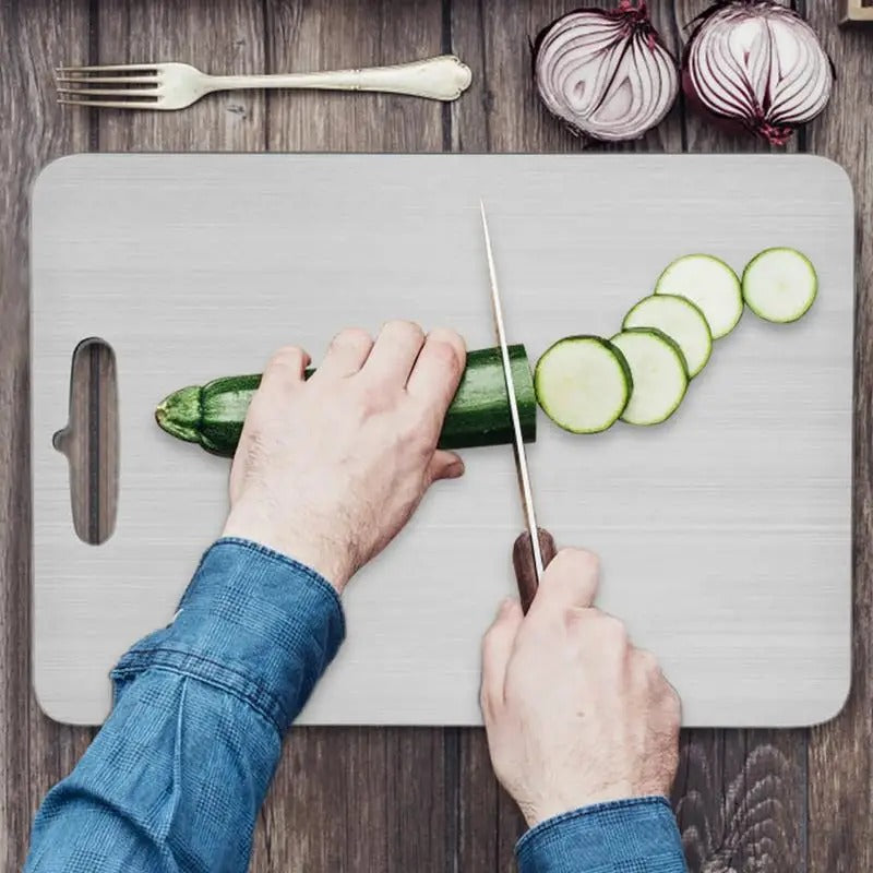 Silver titanium cutting board with brushed surface and integrated handle opening