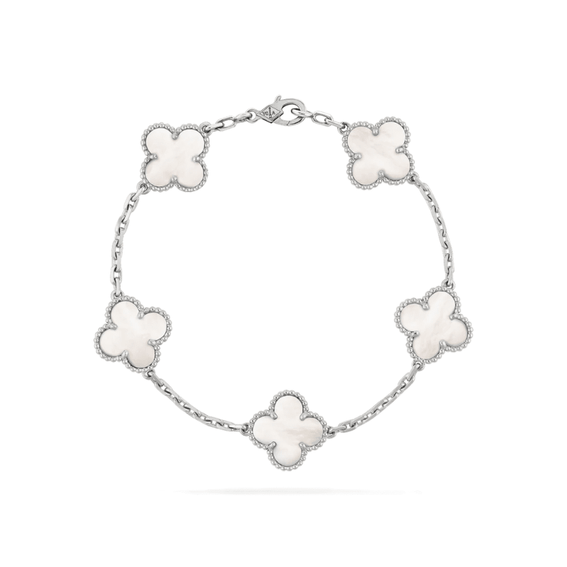 Adjustable linked chain bracelet with five clover-shaped charms