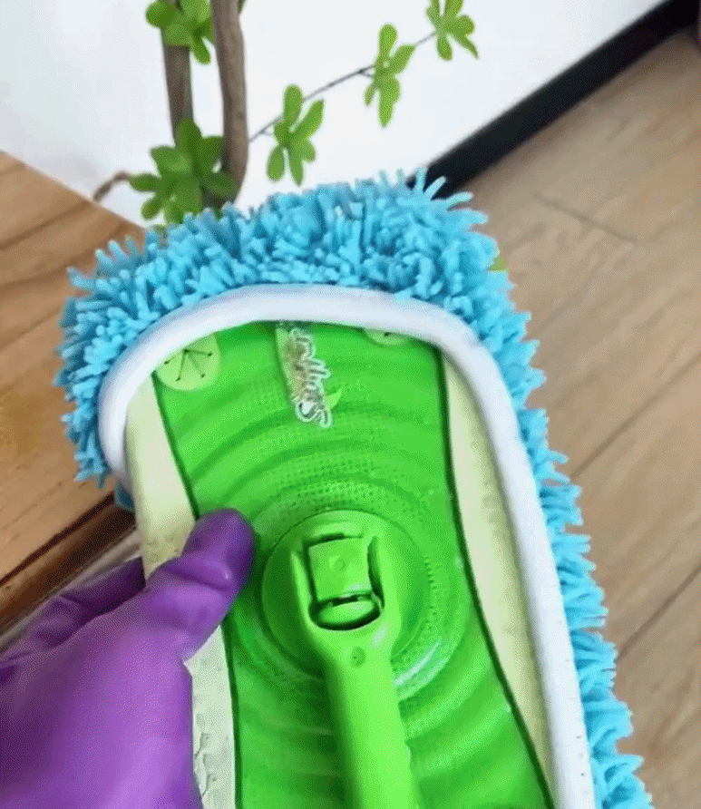 Reusable green floor mop pad with long fibres and silver handle