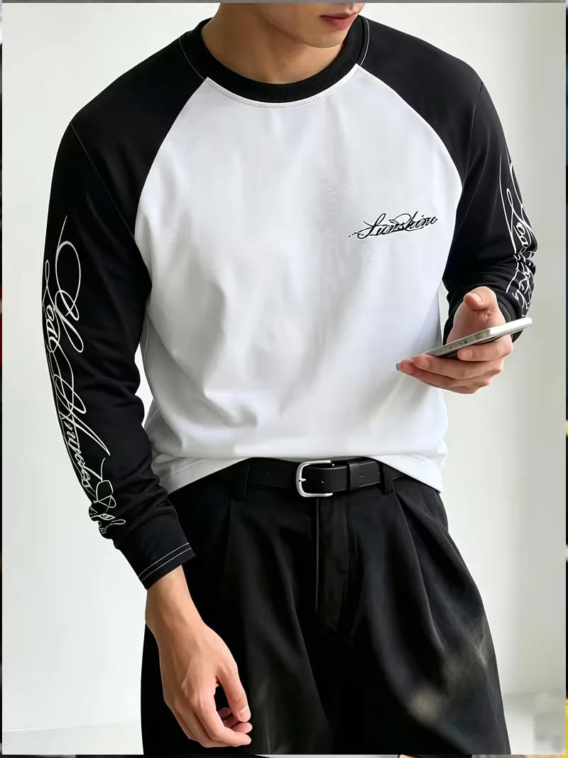 Black and white long sleeve colour block shirt with graphic sleeve prints