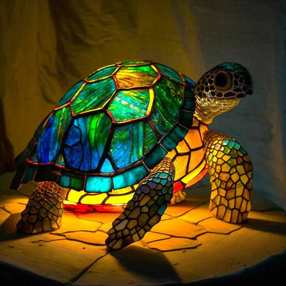 Colourful animal design table lamp with stained glass effect panels