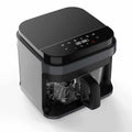 Black air fryer with clear glass basket and digital touch controls