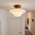 Flush ceiling light with layered white glass shade and walnut-effect ceiling mount