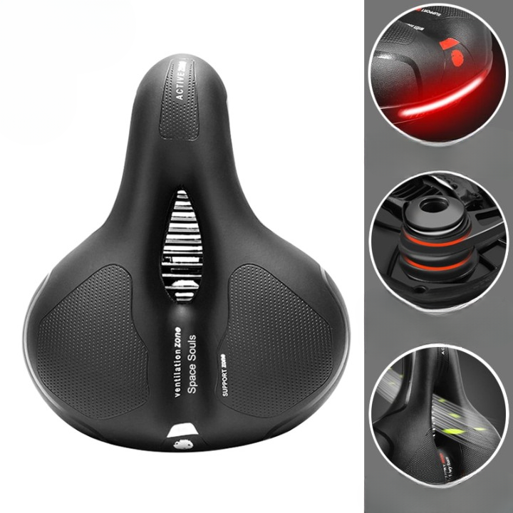Ergonomic bicycle saddle with textured support panels, ventilation zone and suspension springs