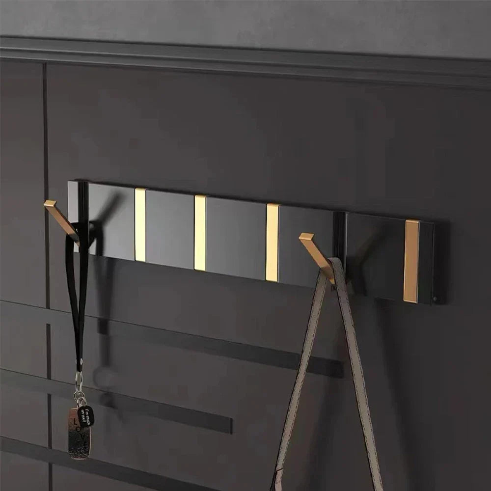 Folding two-hook wall-mounted coat and towel holder