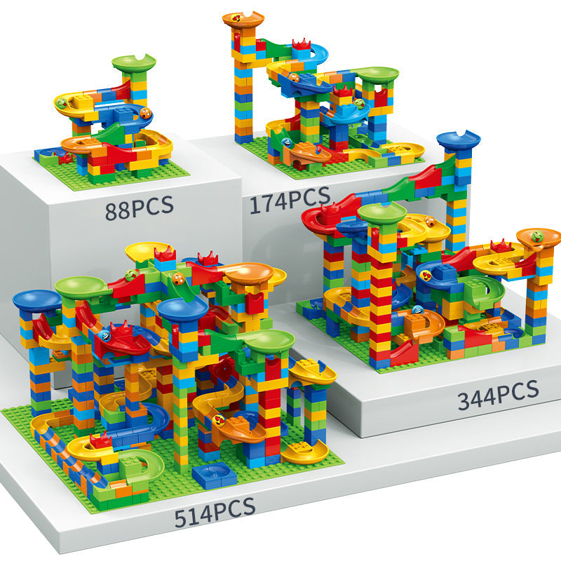 Colourful marble run construction set with interlocking blocks, ramps and tracks