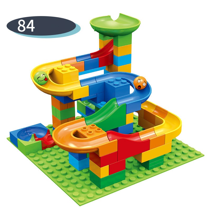 Colourful marble run construction set with interlocking blocks, ramps and tracks